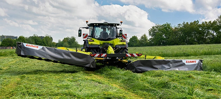 DISCO mower with one side elevated