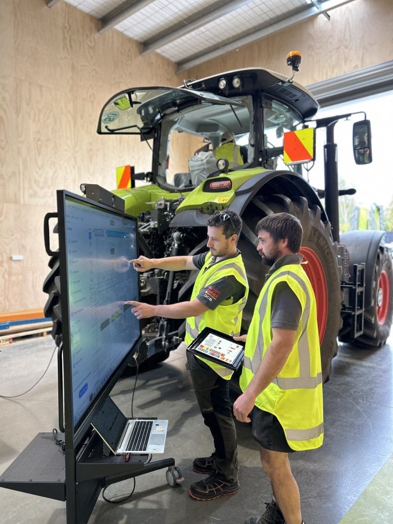 Two men using screen for training